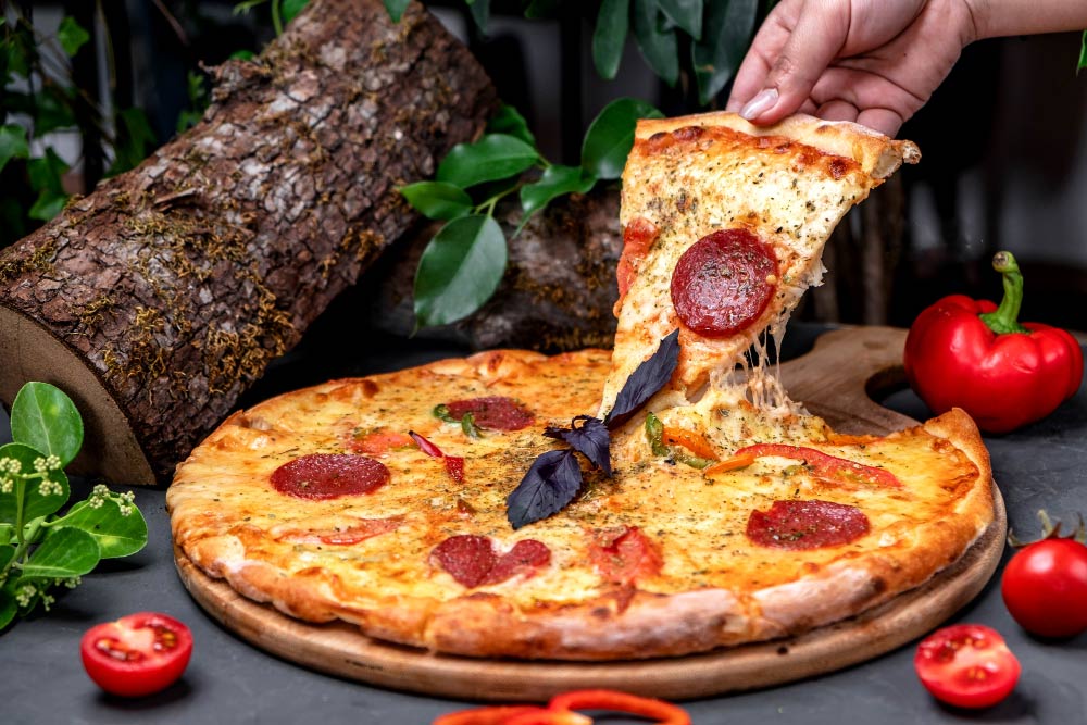 Cómo hacer que la pizza sea menos grasosa